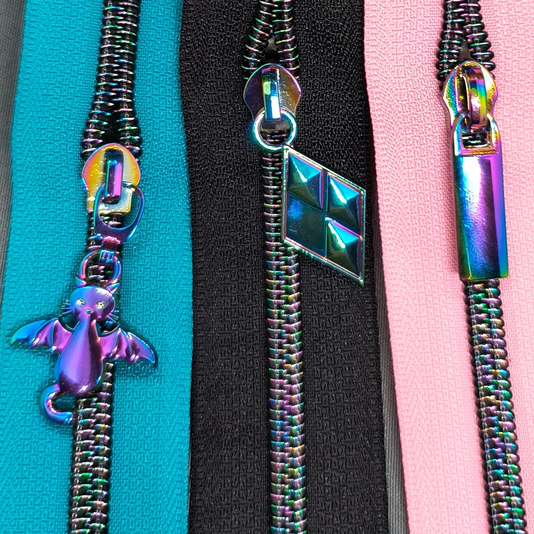 Dark Galaxy Teeth on Turquoise Zipper Tape