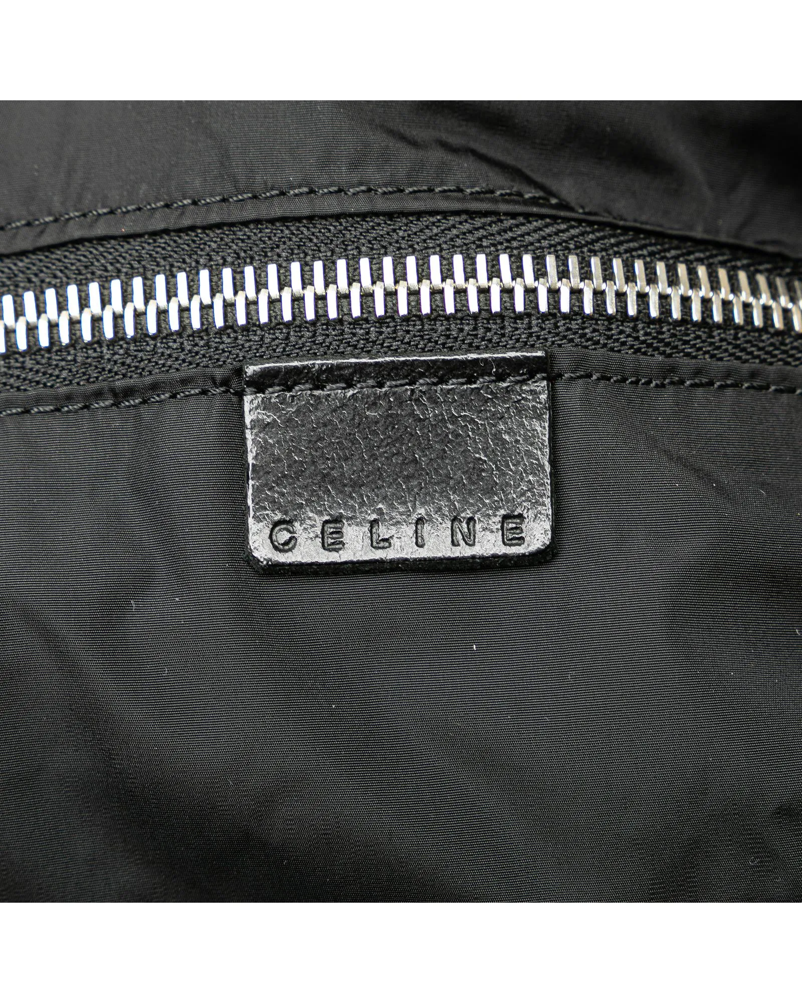 Nylon Travel Bag with Leather Trim and Multiple Pockets